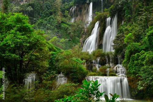 Great waterfall in Thailand. Beautiful waterfall in the green forest. Waterfall in tropical forest at Umpang National park, Tak, Thailand. © MrSathit