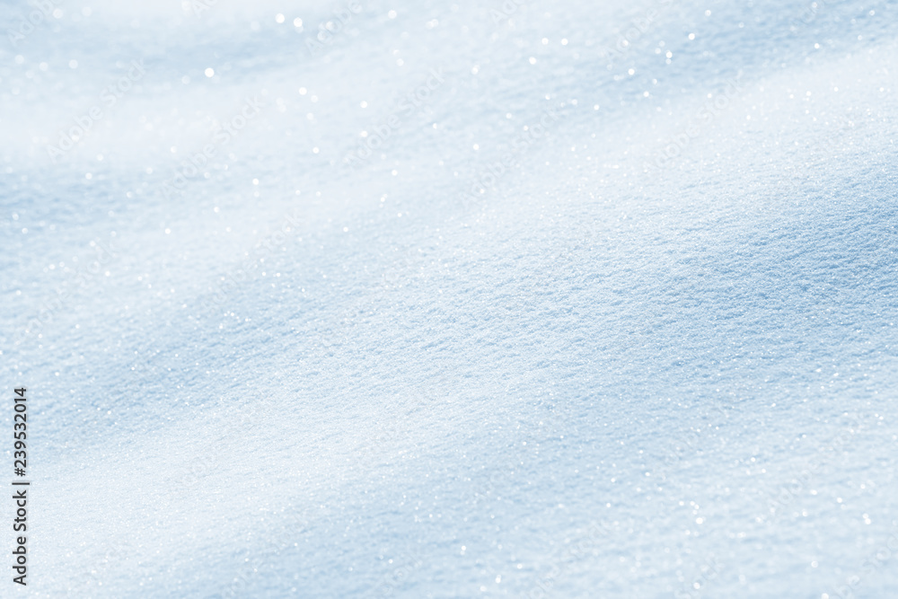 Fresh snow background texture. Winter background with snowflakes and snow mounds. Snow lumps.