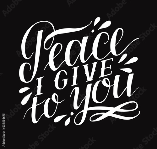 Hand lettering with bible verse Peace I give to you on black background.