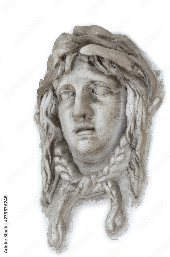 The face of a woman from the ancient era of Greece .