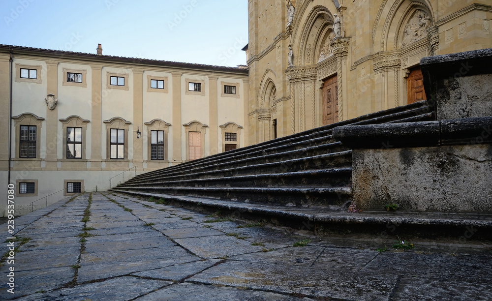 landscape of old town of Arezzo with Cathedral facade, after a rainfall