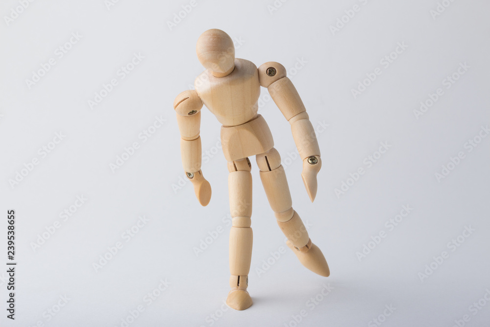 Wooden dummy standing on one leg Wooden dummy standing on one leg