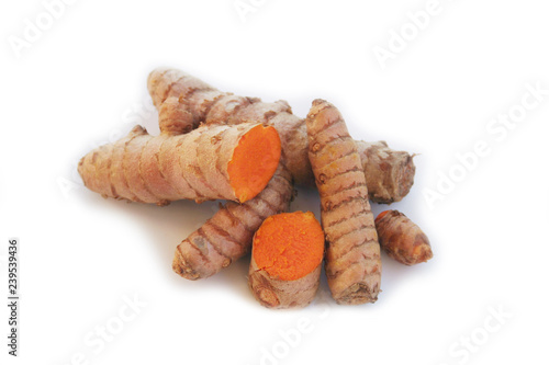 Close- up of Turmeric rhizome isolated on white background. Curcuma longa with selective focus
 photo