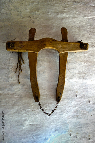 Cow yoke hangs on the wall photo