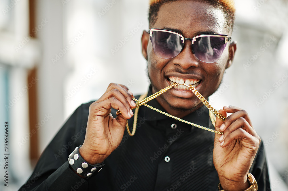 Harmonious equilibrium software Chic handsome african american man in black shirt with gold chain and sunglasses. Stock Photo | Adobe Stock Harmonious equilibrium software Chic handsome african american man in black shirt with gold chain and sunglasses. Stock Photo | Adobe Stock