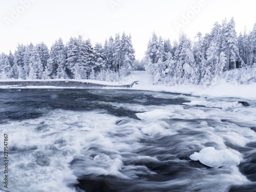 Storforsen, waterfall in the North of Sweden in winter © Tamara Sushko