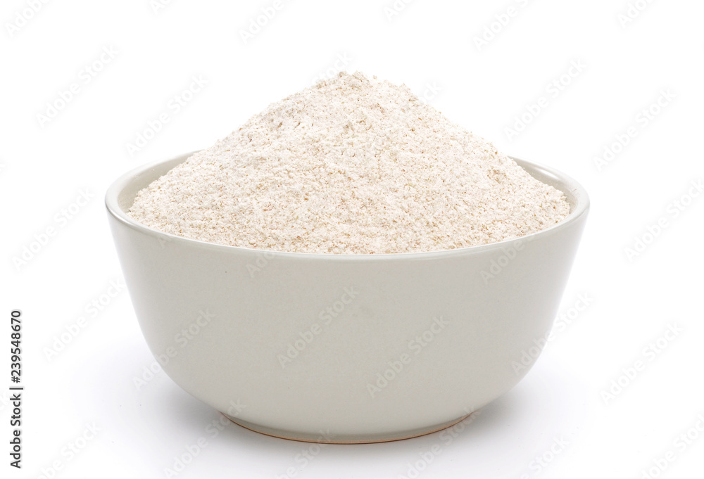 Whole flour in bowl isolated on white background Whole flour in bowl isolated on white background