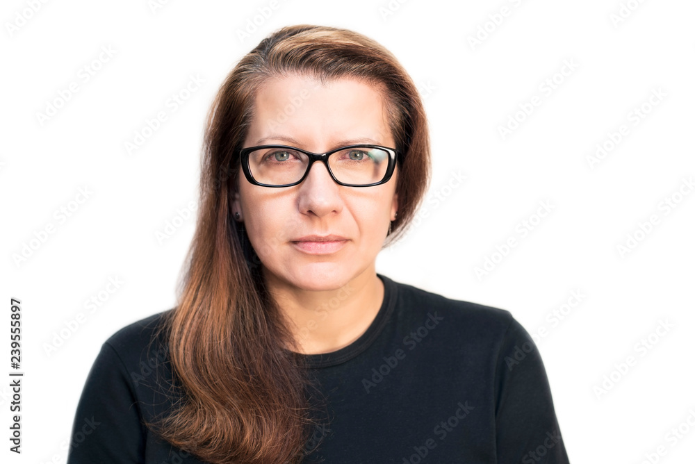 Woman on a white background with red, tired eyes. A woman recently began to wear glasses because her eyesight began to deteriorate