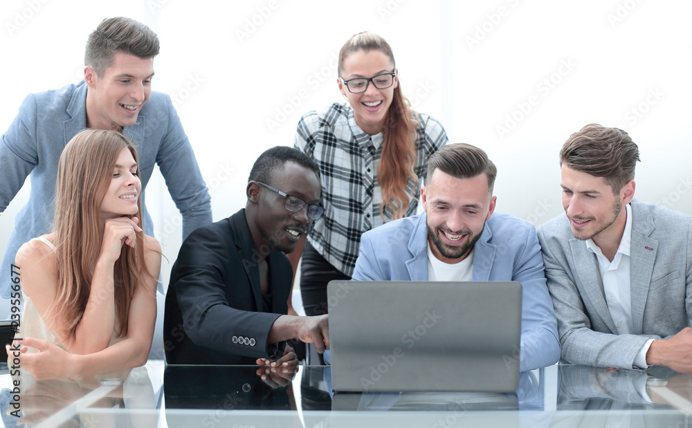 Business meeting in office with laptop computer Business meeting in office with laptop computer