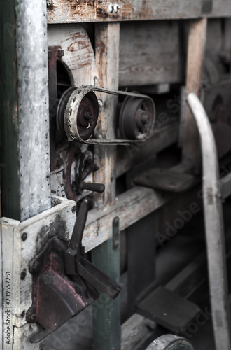 Details on an old engine in Cernat village, Transylvania, Romania. Old machines, old utensils. Hdr image photo