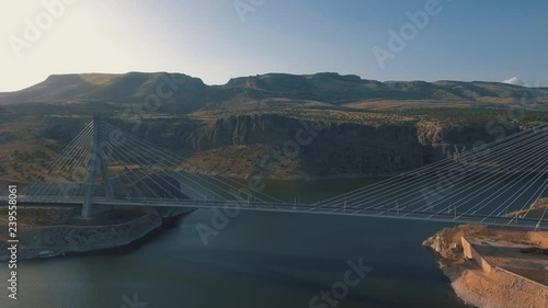 The Nissibi Euphrates Bridge is a cable-stayed bridge completed on May 21, 2015, spanning the Lake Ataturk Dam on the Euphrates River at the provincial border of Adiyaman – Sanliurfa. photo