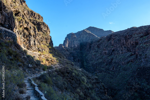 small channel for water supply under puth in Tenerife photo