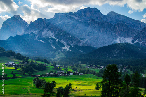 Scenic landscape panoramic view of Cortina D´Ampezzo and Tofana mountains, highest peaks in Dolomites, Italy. Popular tourist destination/attraction for active family holiday. Summer warm colours © Dajahof