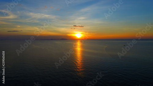 aerial image from drone of an stunning beautiful sea sunset with turquoise water with copy space for your text.Beautiful Sand beach with turquoise water,aerial UAV drone shot
