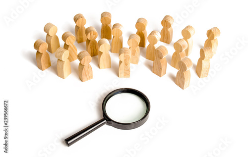 Photos Huge crowd of people stand near a magnifying glass on a white background