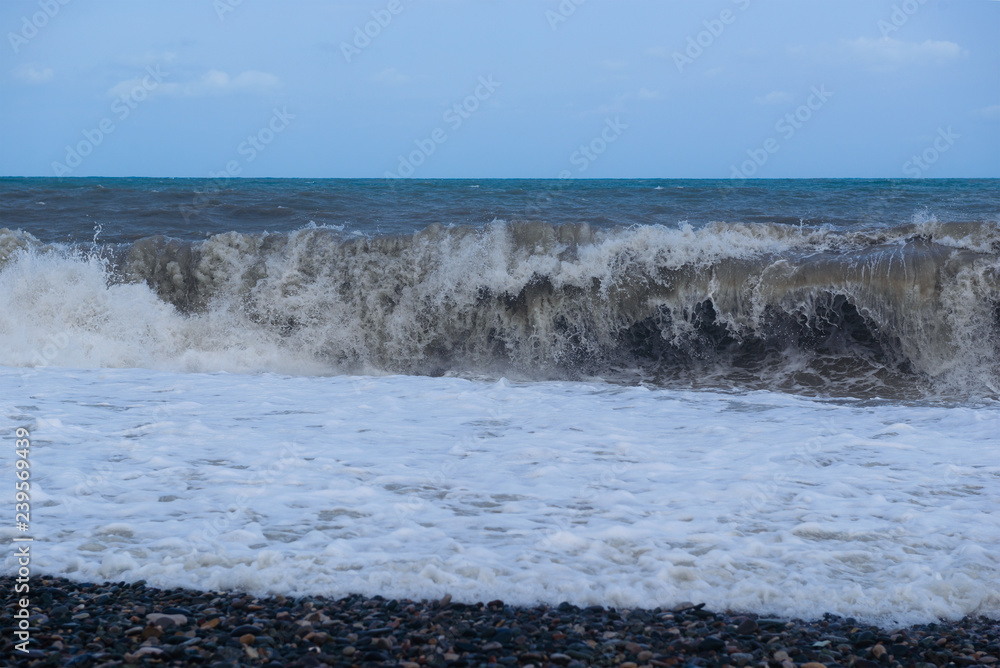 Stormy sea waves breaking near the coast Stormy sea waves breaking near the coast