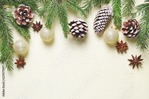 Christmas composition on wooden background.