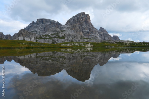 Fototapeta Naklejka Na Ścianę i Meble -  Dolomite Alp mountain near the lakewith reflection in Italy