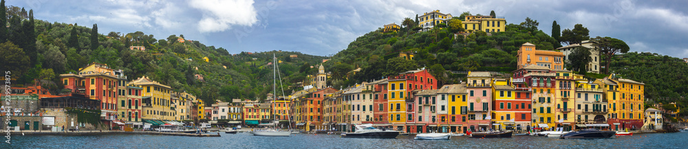 beach streets and colorful houses on the hill in Portofino in Liguria in Italy 