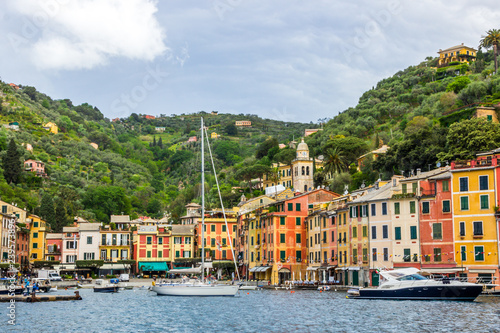 beach streets and colorful houses on the hill in Portofino in Liguria in Italy 