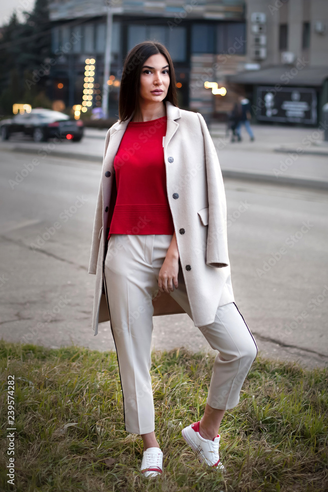 young woman walking on street young woman walking on street