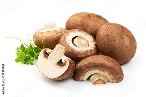 Champignon Mushrooms with parsley, close-up, isolated on white background