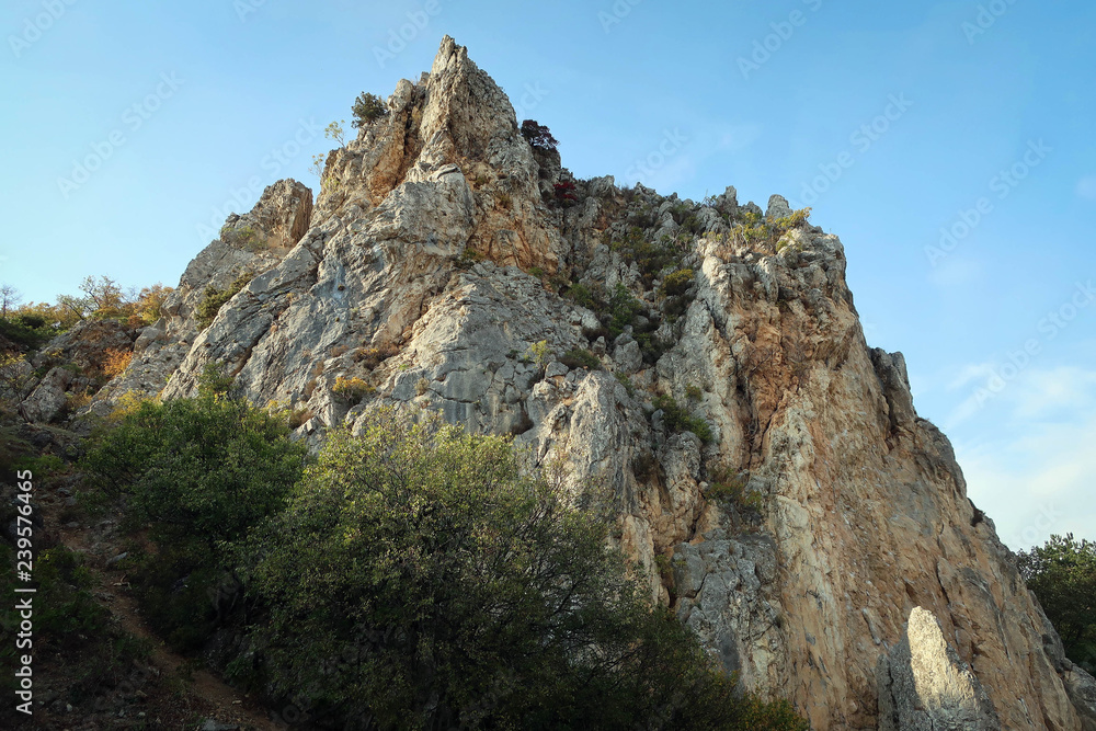 Scenic landscape of South Coast of Crimea with cliffs and autumn forest, Russia Scenic landscape of South Coast of Crimea with cliffs and autumn forest, Russia
