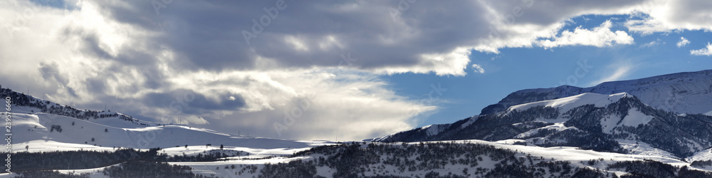 Panorama of winter mountains at evening