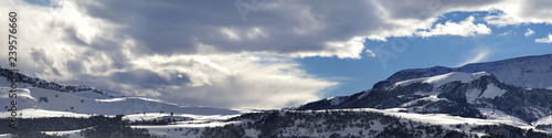 Panorama of winter mountains at evening © BSANI