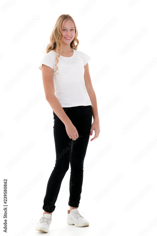 Little school girl pointing to her empty white t-shirt. Little school girl pointing to her empty white t-shirt.