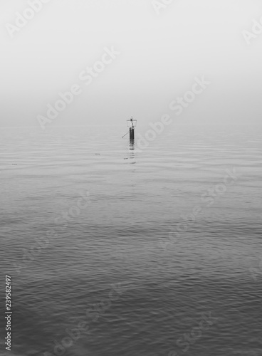 single buoy on a calm ocean