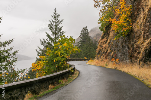 Fall colors on a misty road along the Hood River