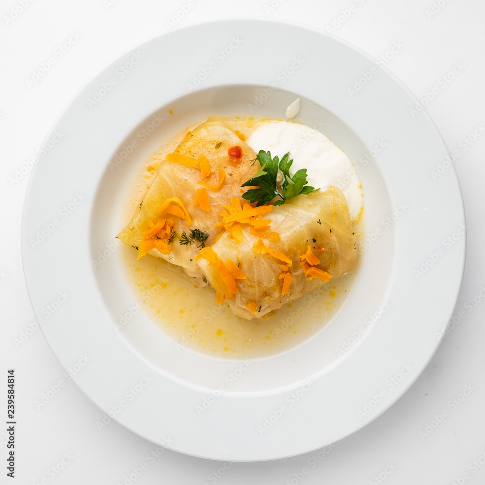 lahanodolmathes with broth based sauce and dill lahanodolmathes with broth based sauce and dill