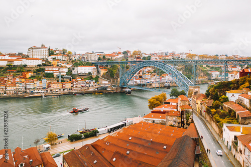 November 10, 2018. Porto, Portugal. Dom-Luis bridge at Porto in nPortugal. Barcos rabelos. photo