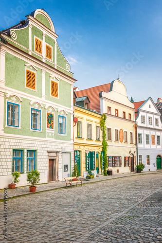 Colorful facades of houses in the historic center of the medieval town Cesky Krumlov, Czech Republic, Europe.