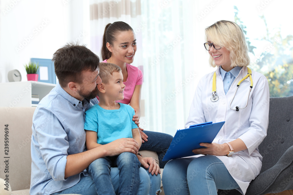 Children's doctor visiting little boy at home Children's doctor visiting little boy at home