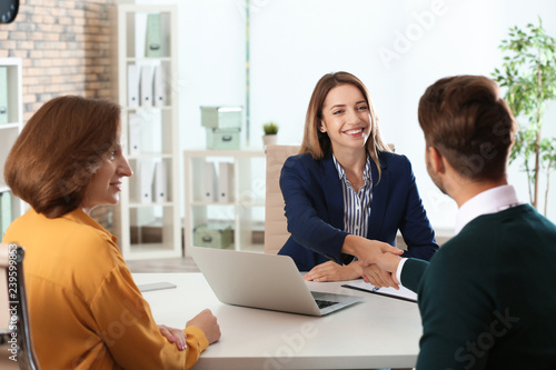 Human resources manager conducting job interview with applicants in office photo