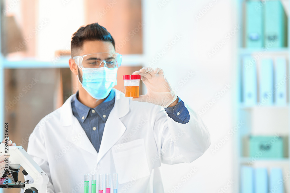 Young scientist working in laboratory. Chemical analysis Young scientist working in laboratory. Chemical analysis