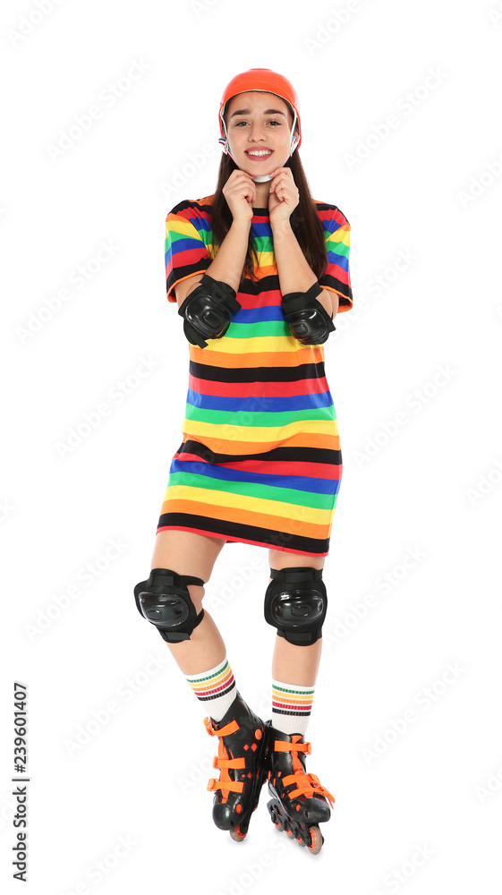 Full length portrait of young woman in bright dress with roller skates on white background Full length portrait of young woman in bright dress with roller skates on white background