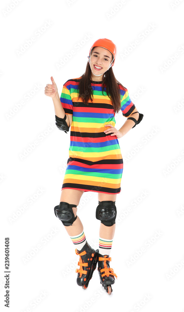 Full length portrait of young woman in bright dress with roller skates on white background Full length portrait of young woman in bright dress with roller skates on white background