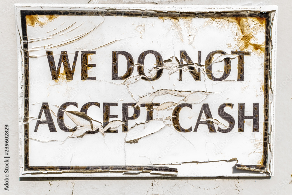 Fototapeta premium Sign on wall saying cash only business