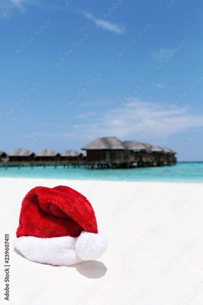 Santa hat on chair with water lodges on background Santa hat on chair with water lodges on background