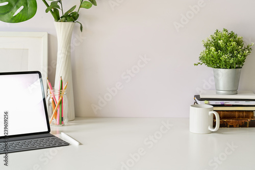 Office desk top table with office supplies, workspace and copy space photo