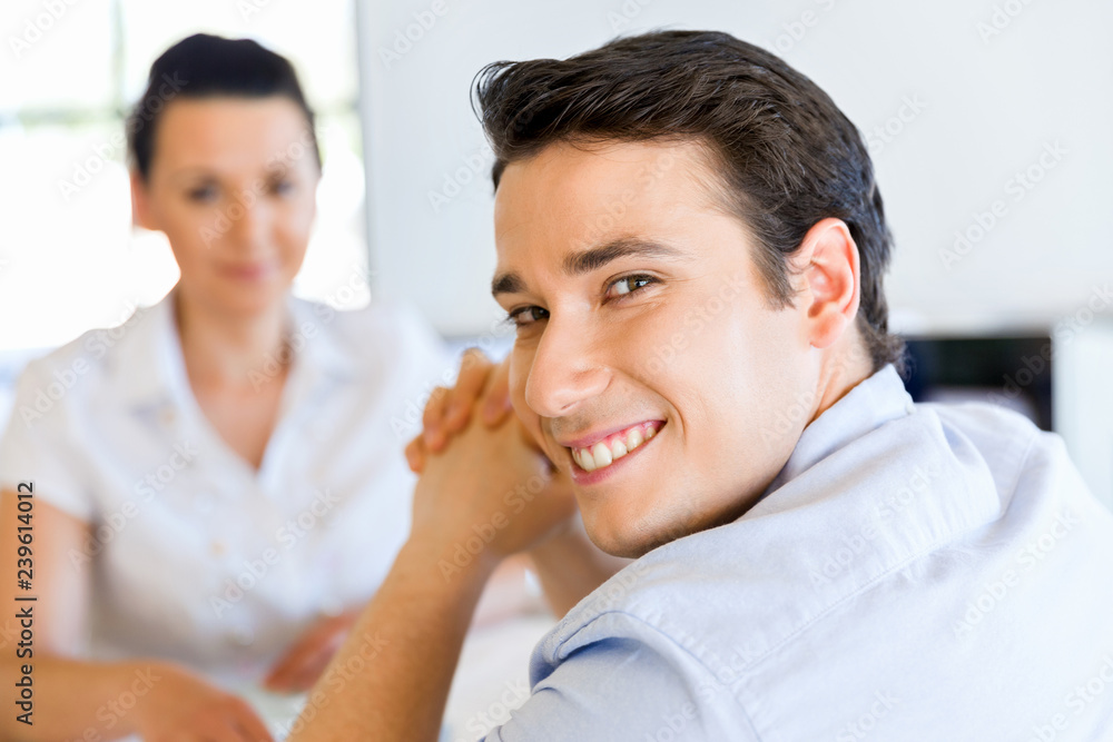 Young man in casual in office Young man in casual in office