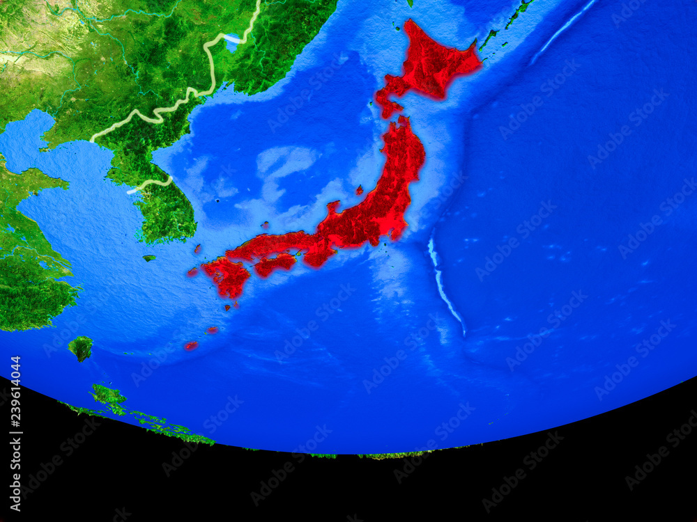 Japan from space on model of planet Earth with country borders.