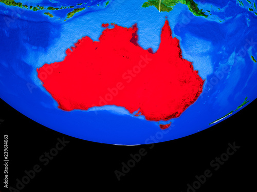 Australia from space on model of planet Earth with country borders.