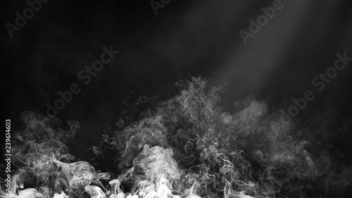 Dry ice smoke clouds fog floor texture. .White perfect spotlight mist effect on isolated black background