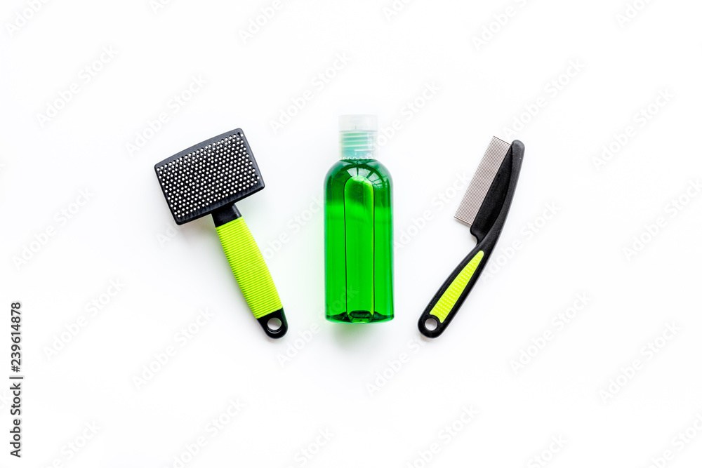 Pet accessories for care and training. Brushes on white background top view mock-up Pet accessories for care and training. Brushes on white background top view mock-up