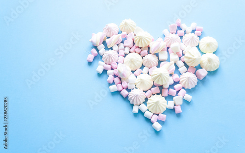 various pastel marshmallows on a blue background