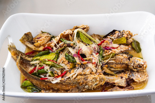 Indonesian food fried fish cooked with taucu or ikan masak tauco